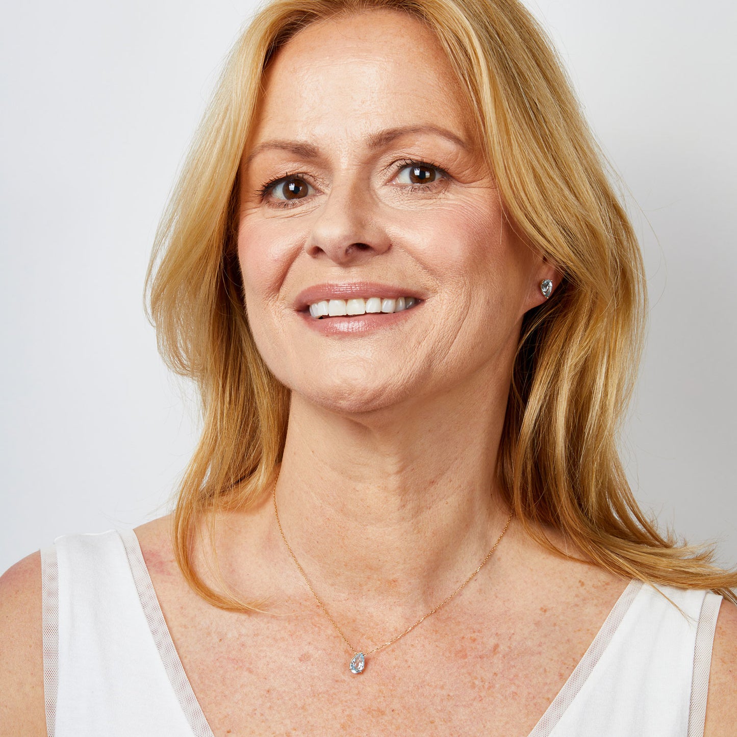 9ct Yellow Gold Pear Shape Blue Topaz Earrings