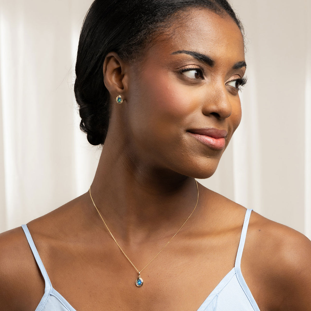 9ct Yellow Gold Blue Opal Earrings