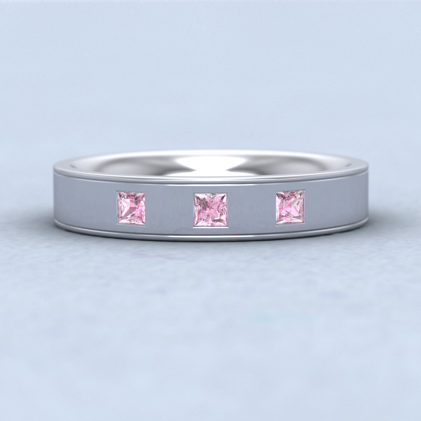 Princess Cut Pink Sapphire And Line Patterned 9ct White Gold 4mm Wedding Ring