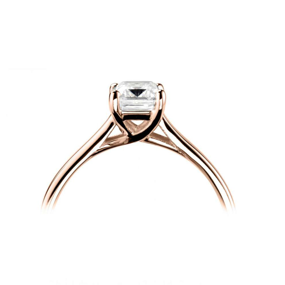 18ct rose gold emerald cut four claw diamond ring