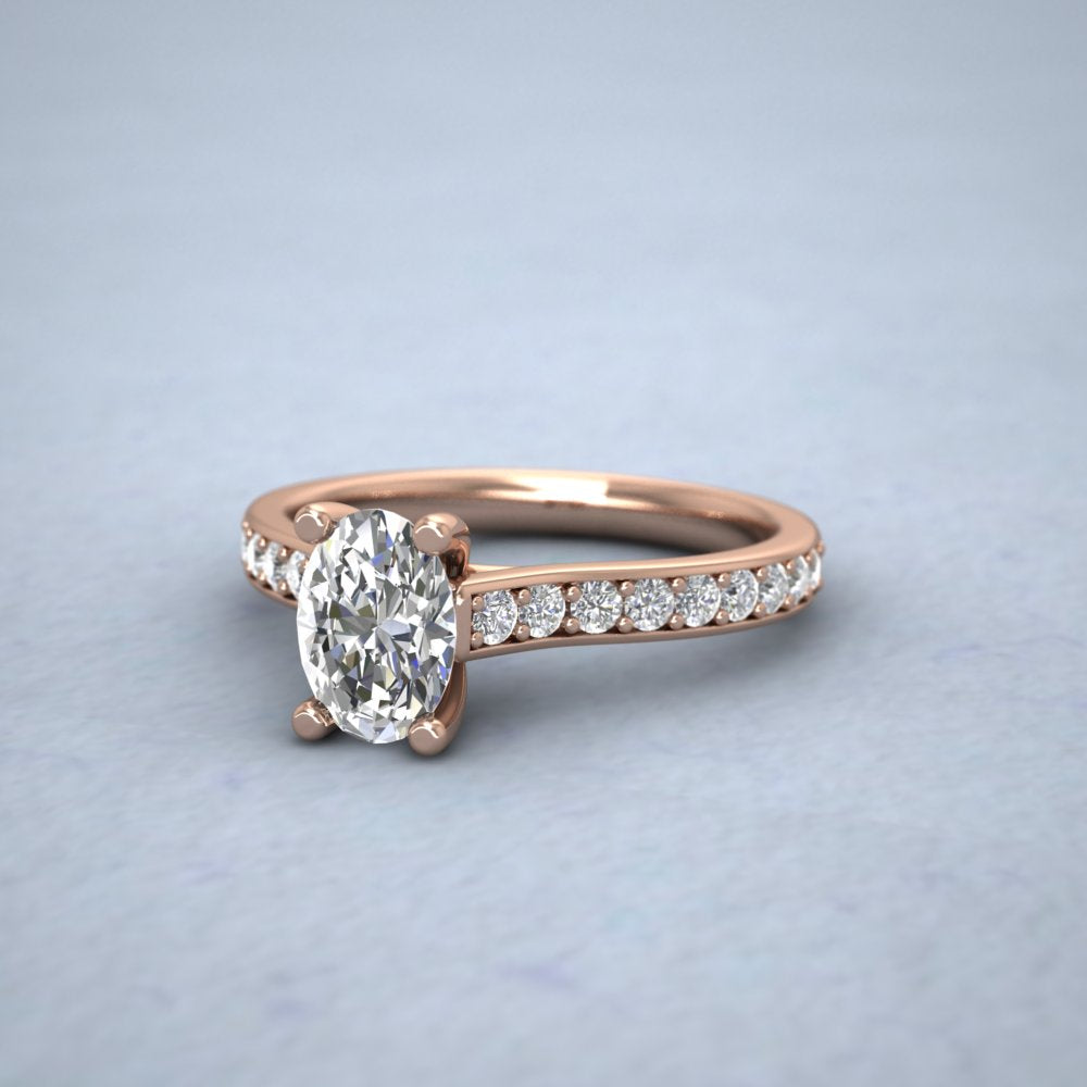 9ct Rose Gold Four Claw Set Oval Diamond Ring With Shoulder Stones