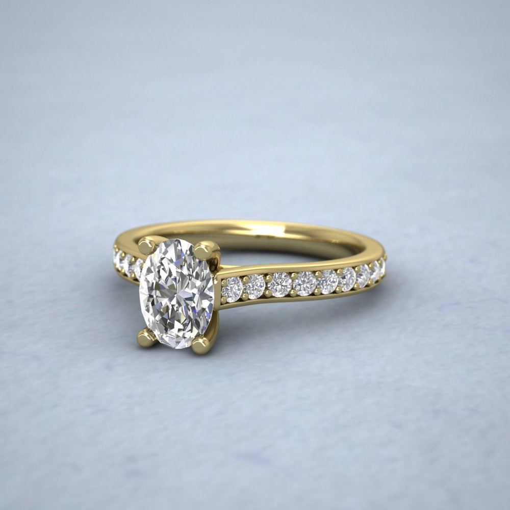 9ct Yellow Gold Four Claw Set Oval Diamond Ring With Shoulder Stones