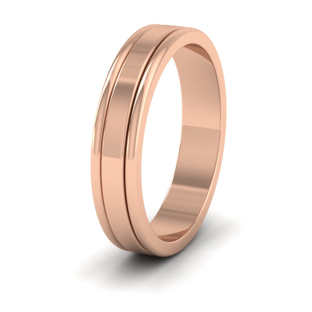 <p>9ct Rose Gold Rounded Edge Grooved Pattern Flat Wedding Ring.  4mm Wide </p>