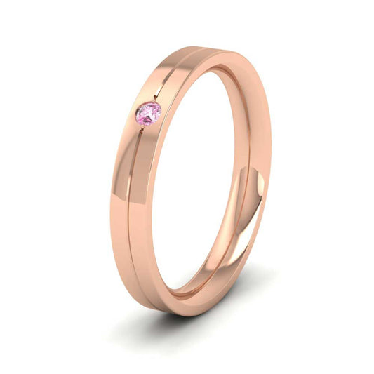 <p>18ct Rose Gold Pink Sapphire Set Flat Wedding Ring With Line Pattern.  3mm Wide And Court Shaped For Comfortable Fitting</p>