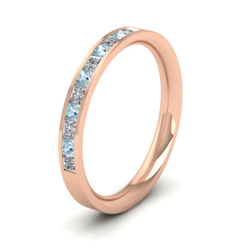 <p>18ct Rose Gold Channel Set Diamond And Aquamarine (0.48ct) Flat Wedding Ring.  25mm Wide And Court Shaped For Comfortable Fitting</p>