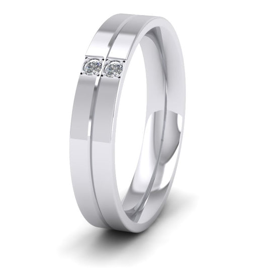 <p>Two Diamond And Line Pattern Flat Wedding Ring In 950 Platinum.  4mm Wide And Court Shaped For Comfortable Fitting</p>