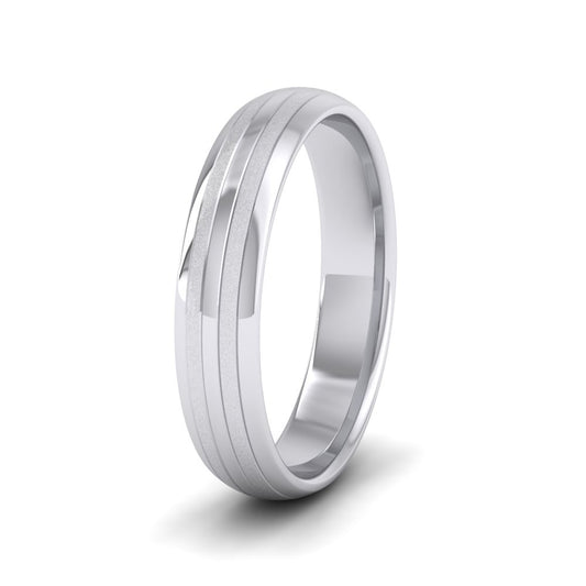 <p>950 Platinum Four Line Pattern With Shiny And Matt Finish Wedding Ring.  4mm Wide And Court Shaped For Comfortable Fitting</p>