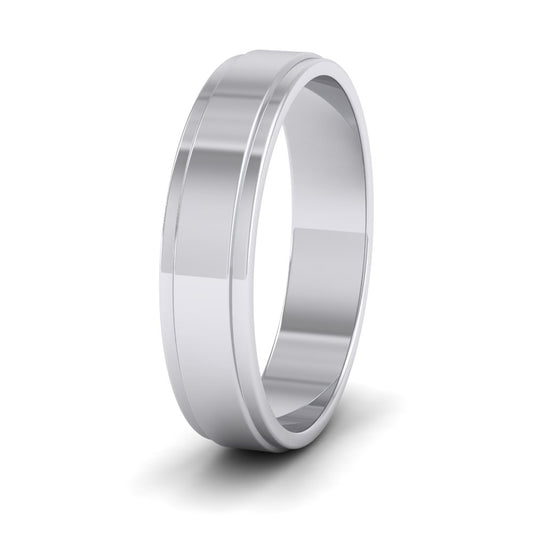 <p>9ct White Gold Stepped Edge Pattern Flat Wedding Ring.  5mm Wide </p>