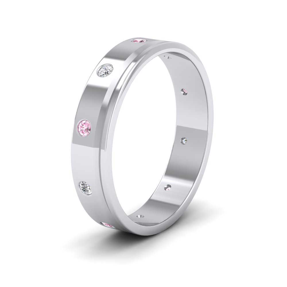 <p>9ct White Gold Diamond And Pink Sapphire Set Flat Line Patterned Wedding Ring.  4mm Wide </p>