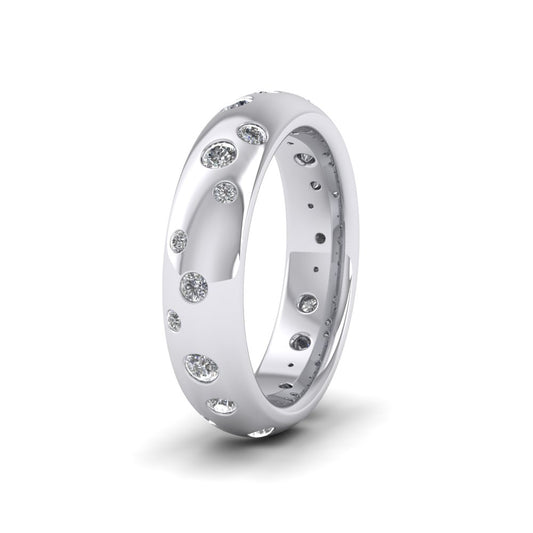 <p>18ct White Gold Scatter Diamond Set Wedding Ring (0.52ct).  5mm Wide And Court Shaped For Comfortable Fitting</p>