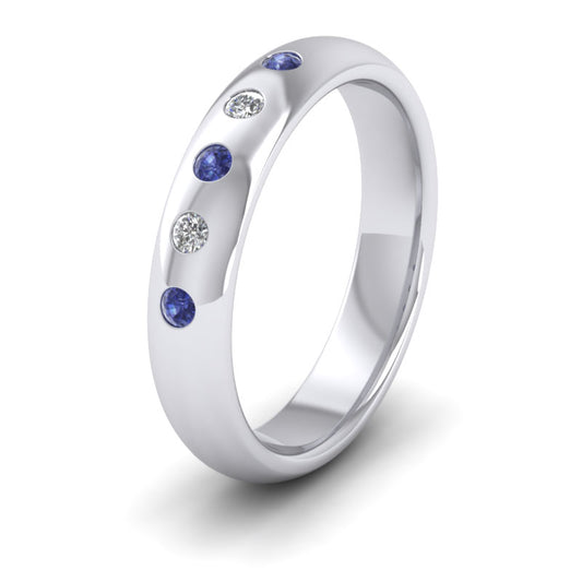 <p>14ct White Gold Blue Sapphire And Diamond Flush Set Wedding Ring.  4mm Wide And Court Shaped For Comfortable Fitting</p>