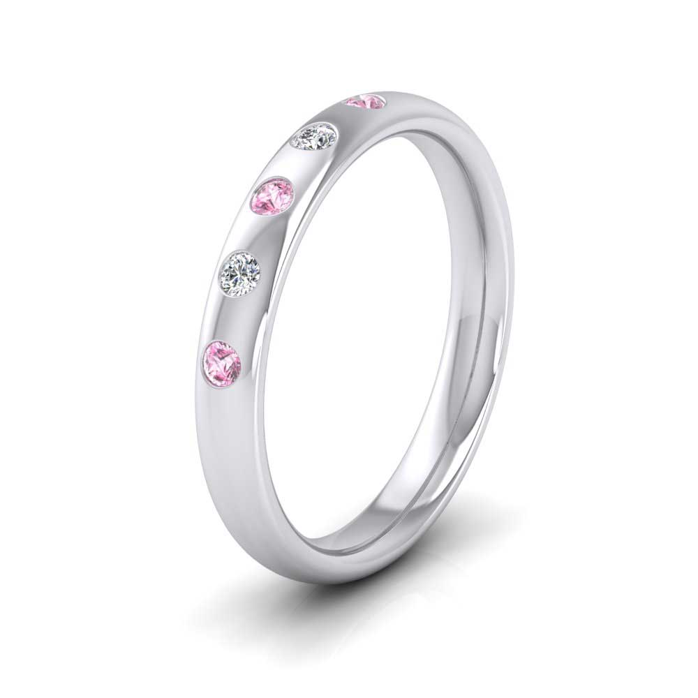 <p>9ct White Gold Pink Sapphire And Diamond Flush Set Wedding Ring.  3mm Wide And Court Shaped For Comfortable Fitting</p>