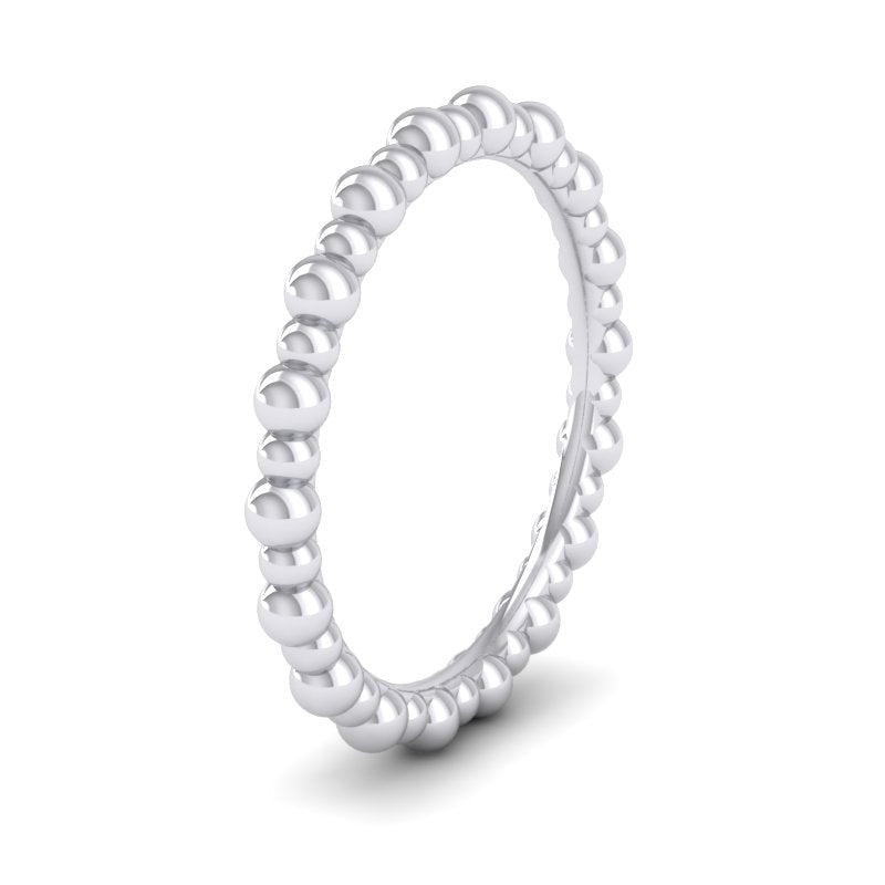 <p>14ct White Gold Bobbly Wedding Ring.  2mm Wide And Court Shaped For Comfortable Fitting</p>