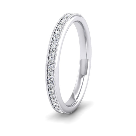 <p>18ct White Gold Full Bead Set 0.7ct Round Brilliant Cut Diamond With Millgrain Surround Wedding Ring.  25mm Wide And Court Shaped For Comfortable Fitting</p>