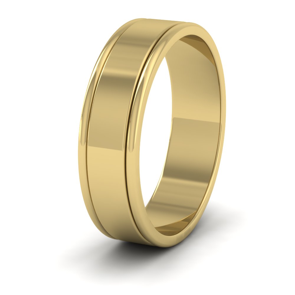 <p>9ct Yellow Gold Rounded Edge Grooved Pattern Flat Wedding Ring.  6mm Wide </p>