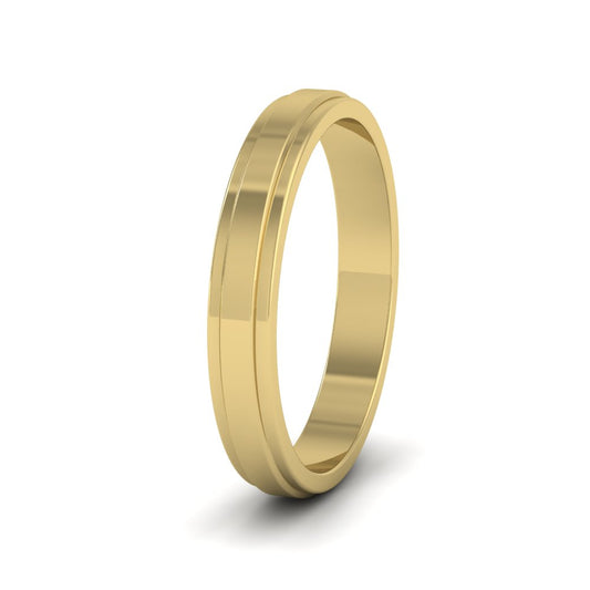 <p>9ct Yellow Gold Stepped Edge Pattern Flat Wedding Ring.  3mm Wide </p>