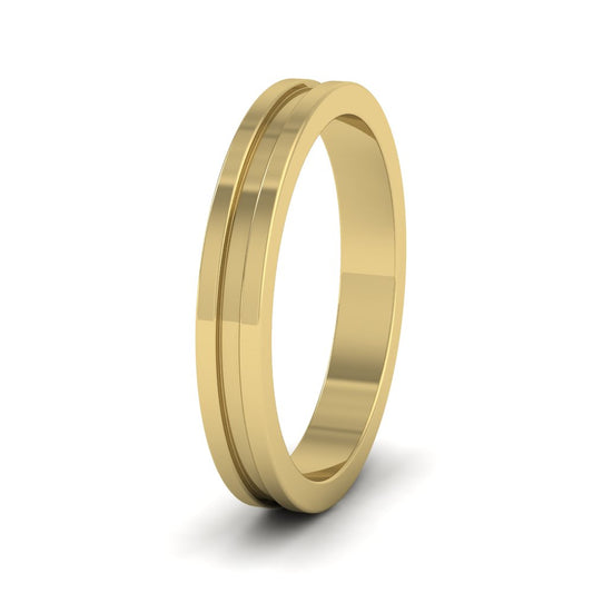 <p>9ct Yellow Gold Flat Central Grooved Wedding Ring.  3mm Wide </p>