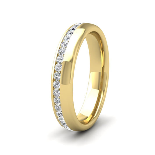 <p>9ct Yellow Gold Asymmetric Full Channel Set Diamond Ring (0.65ct). 4mm Wide And Court Shaped For Comfortable Fitting</p>