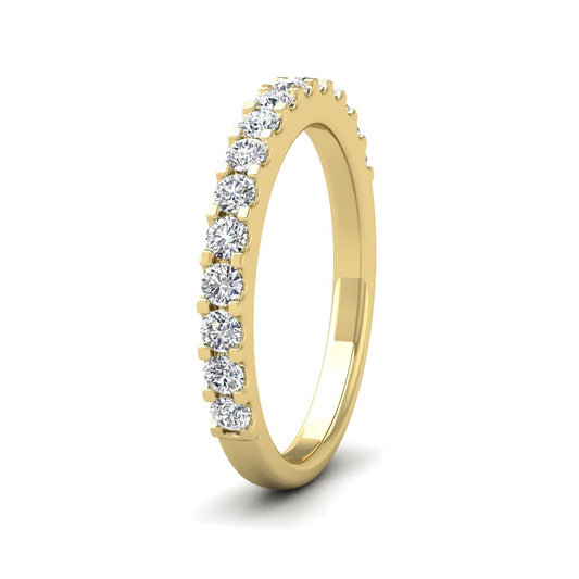 <p>18ct Yellow Gold Round Claw 0.5ct Half Diamond Set Wedding Ring.  25mm Wide And Court Shaped For Comfortable Fitting</p>