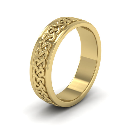 <p>Celtic Pattern With Edge Flat Wedding Ring In 22ct Yellow Gold With Edge.  6mm Wide </p>