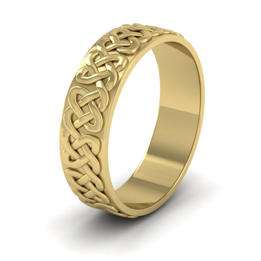 <p>Celtic Patterned Flat Wedding Ring In 18ct Yellow Gold .  6mm Wide </p>