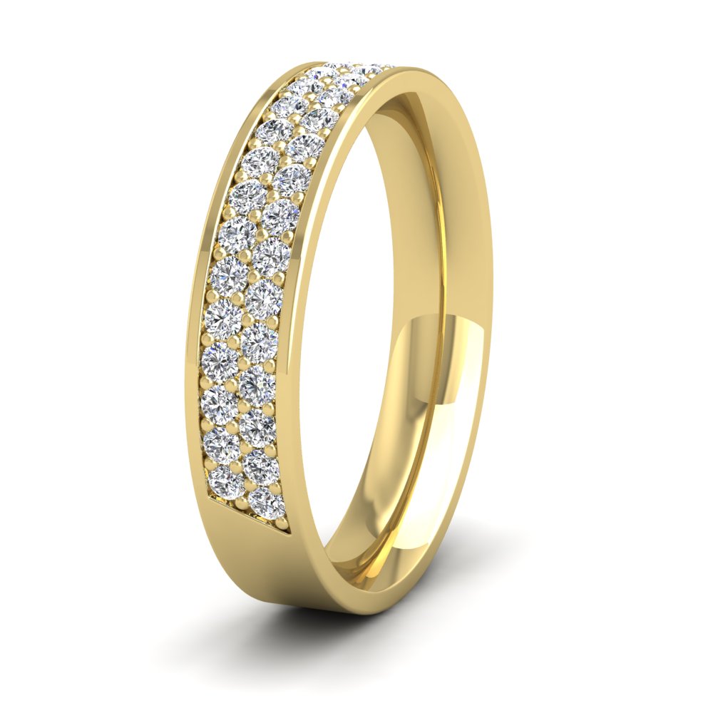<p>18ct Yellow Gold Two Row 0.5ct Half Diamond Set Pave Flat Wedding Ring. 4mm Wide And Court Shaped For Comfortable Fitting</p>