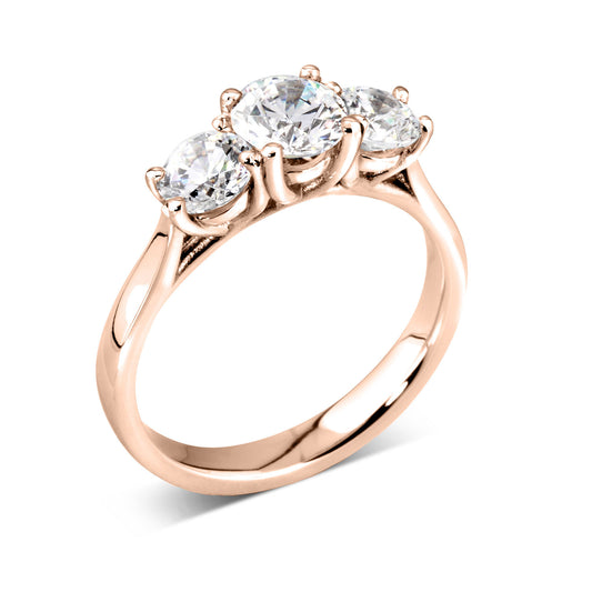 18ct Rose Gold Trilogy Diamond Engagement Ring. Slightly larger Centre Stone