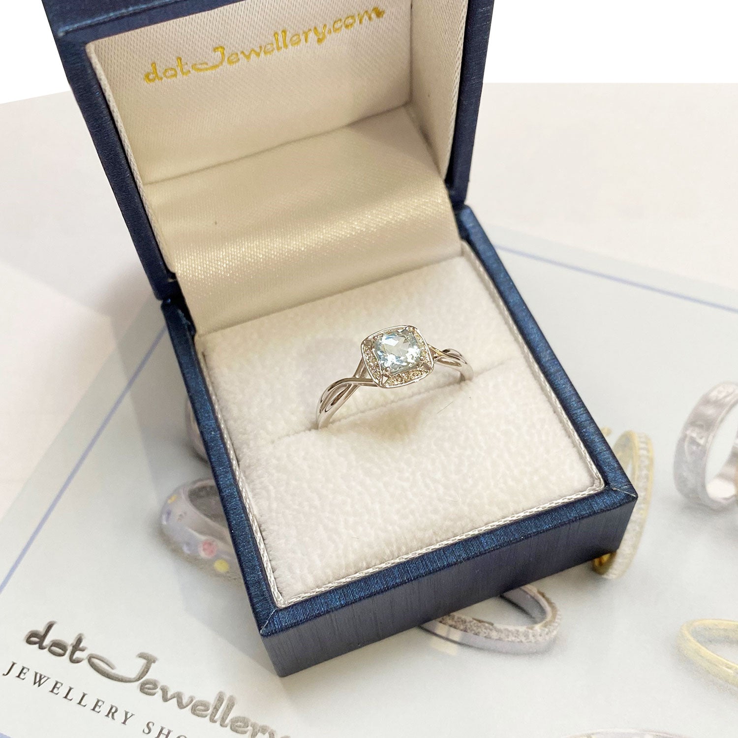9ct White Gold Aquamarine And Diamond Set Twist Dress Ring dotJewellery.com 9ct White Gold Aquamarine And Diamond Set Twist Dress Ring dotJewellery.com
