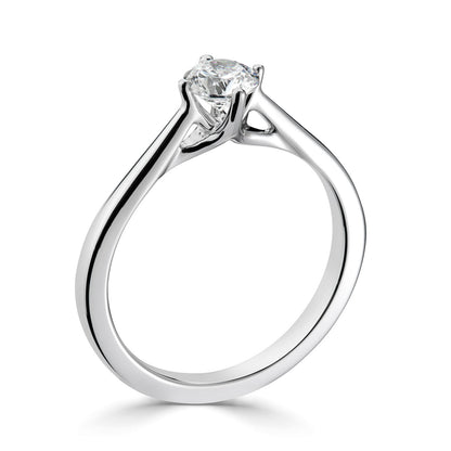 Platinum Four Claw Compass Solitaire Diamond Engagement Ring.