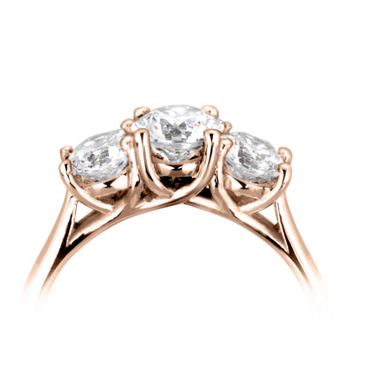 18ct Rose Gold Trilogy Diamond Ring. Slightly larger Centre Stone