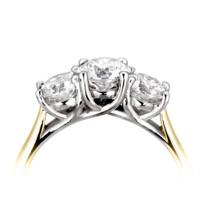 18ct Yellow Gold And Platinum Trilogy Diamond Ring. Slightly larger Centre Stone