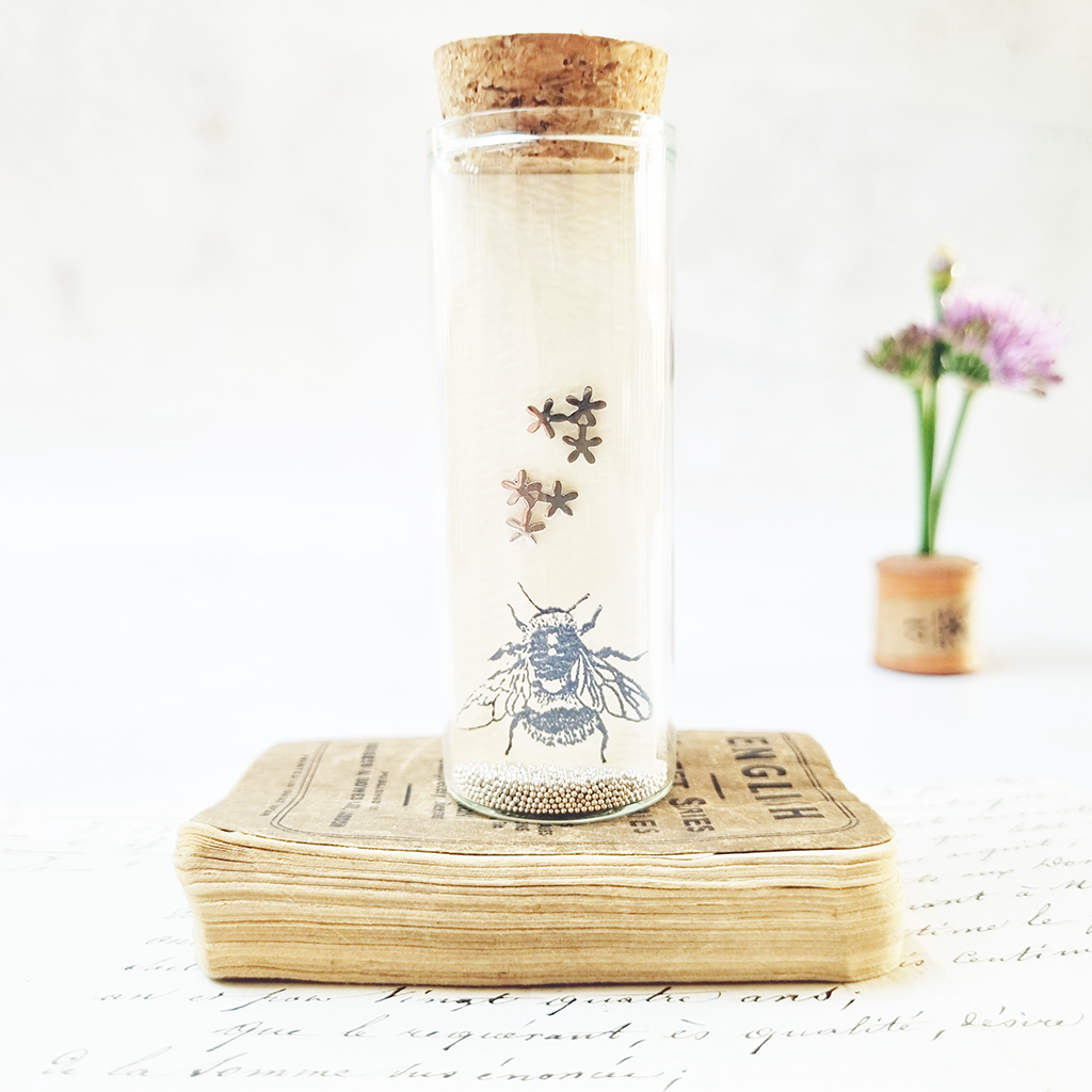 Forget Me Not flower stud earrings in a Bottle