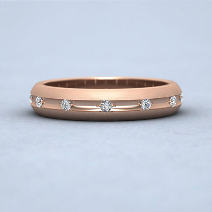 Wedding Ring With Concave Groove Set With Twelve Diamonds 4mm Wide In 9ct Rose Gold Down View