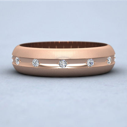 Wedding Ring With Concave Groove Set With Twelve Diamonds 6mm Wide In 9ct Rose Gold Down View