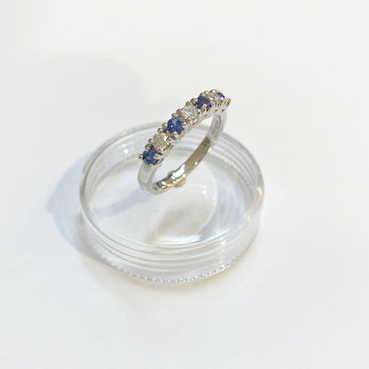 9ct White Gold Seven Stone Diamond And Blue Sapphire Ring