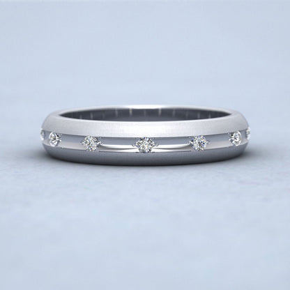 Wedding Ring With Concave Groove Set With Twelve Diamonds 4mm Wide In 14ct White Gold Down View