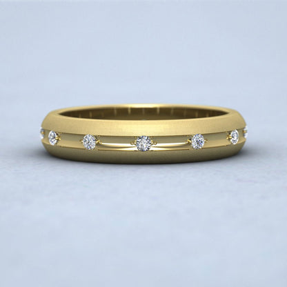 Wedding Ring With Concave Groove Set With Twelve Diamonds 4mm Wide In 9ct Yellow Gold Down View