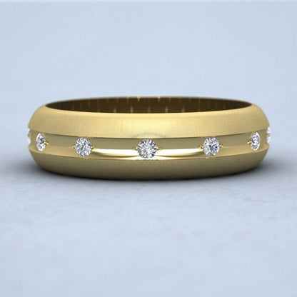 Wedding Ring With Concave Groove Set With Twelve Diamonds 6mm Wide In 9ct Yellow Gold Down View