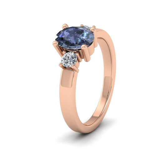 9ct Rose Gold Claw Set Oval Blue Sapphire And Diamond Ring