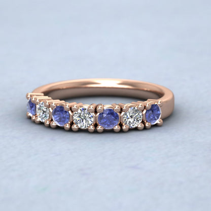 9ct Rose Gold Seven Stone Diamond And Blue Sapphire Ring