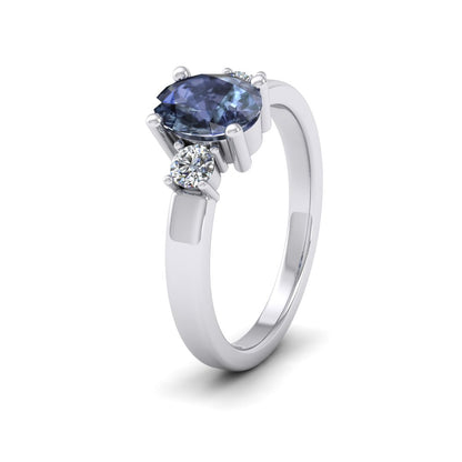 18ct White Gold Claw Set Oval Blue Sapphire And Diamond Ring