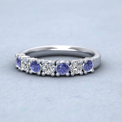 Platinum Seven Stone Diamond And Blue Sapphire Ring