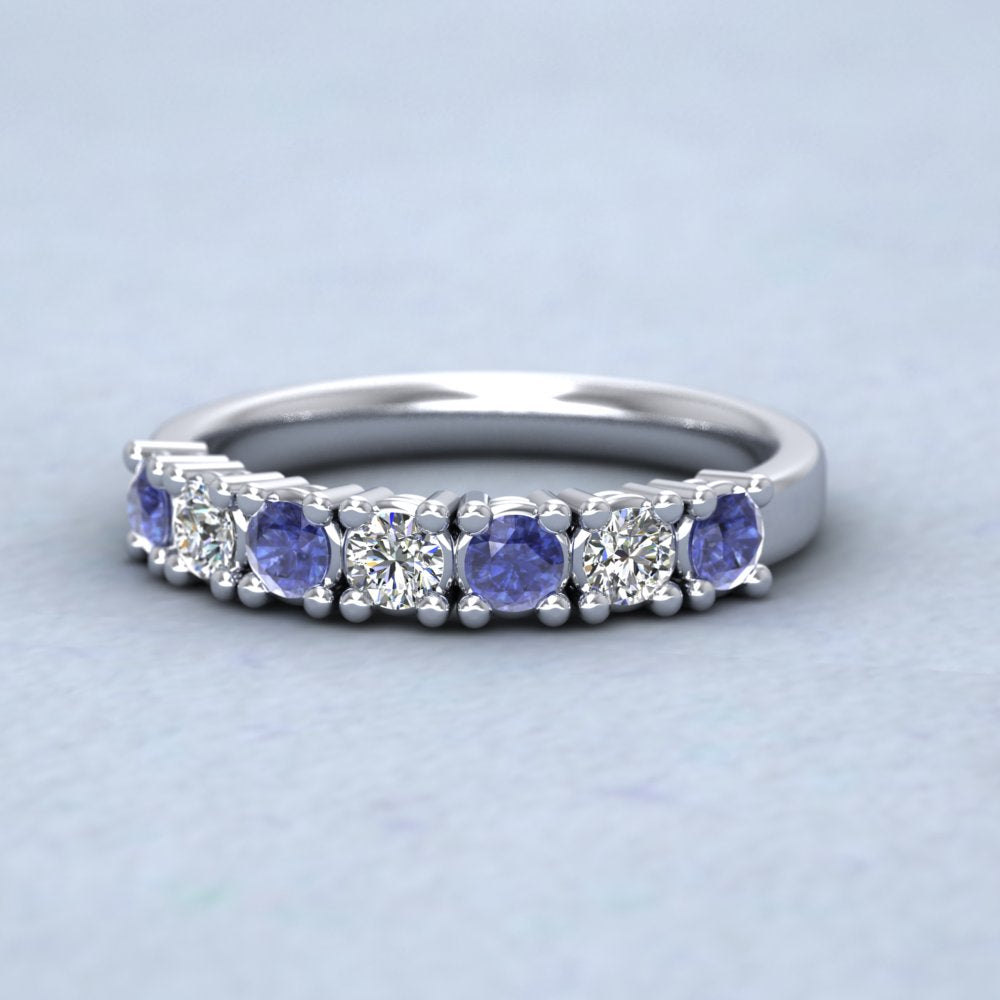 18ct White Gold Seven Stone Diamond And Blue Sapphire Ring