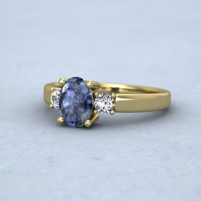 18ct Yellow Gold Claw Set Oval Blue Sapphire And Diamond Ring