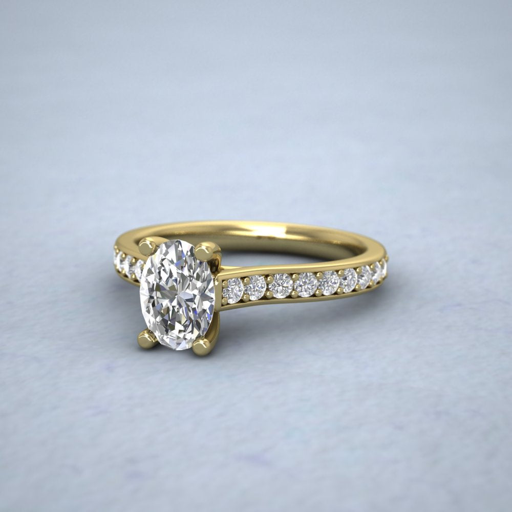 18ct Yellow Gold Four Claw Set Oval Diamond Ring With Shoulder Stones