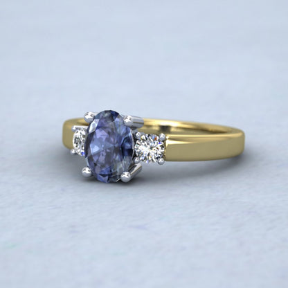 18ct Yellow Gold And Platinum Head Claw Set Oval Blue Sapphire And Diamond Ring