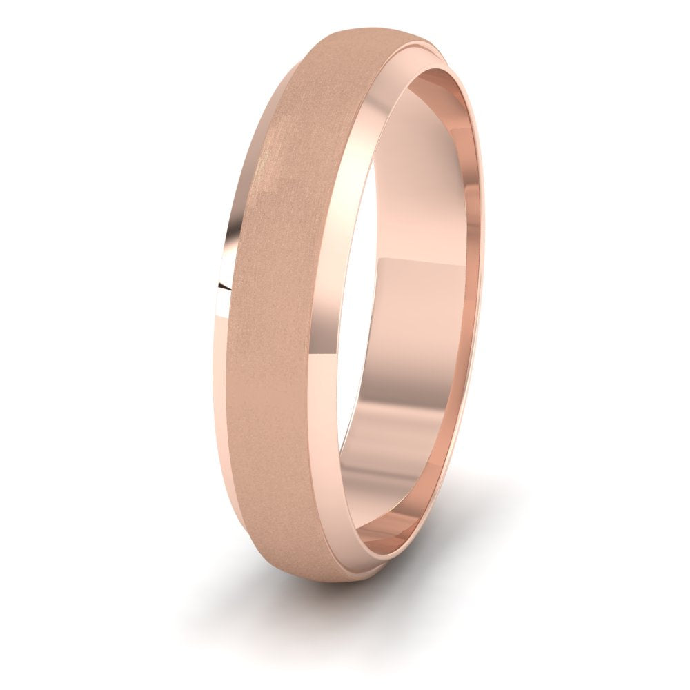 <p>18ct Rose Gold Flat Edge Patterned And Matt Finish Wedding Ring.  5mm Wide </p>
