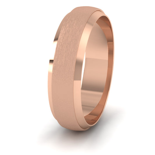 <p>18ct Rose Gold Flat Edge Patterned And Matt Finish Wedding Ring.  6mm Wide </p>
