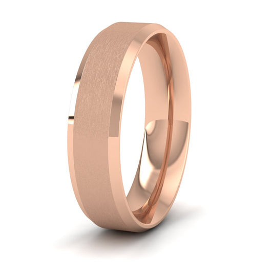 <p>18ct Rose Gold Bevelled Edge And Matt Finish Centre Flat Wedding Ring.  6mm Wide And Court Shaped For Comfortable Fitting</p>