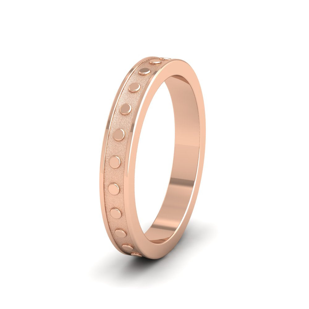 <p>18ct Rose Gold Raised Circle And Edge Patterned Flat Wedding Ring.  3mm Wide </p>